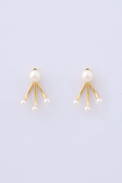 Pair of gold plated earrings by Miro Miro, featuring a natural freshwater pearl stud, and an ear jacket with three matching freshwater pearls on a pronged finish.