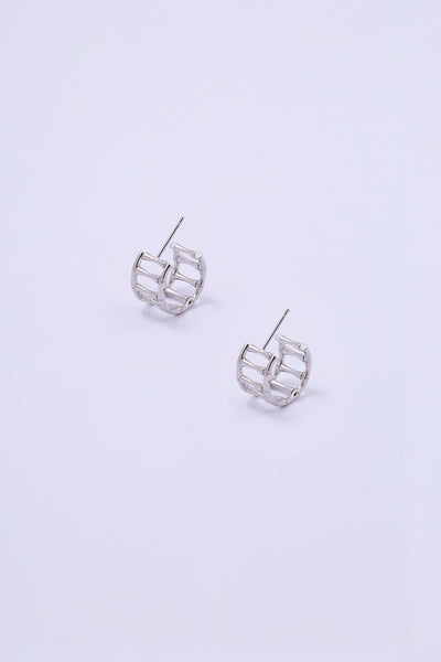 Small bamboo shaped hoop earrings in silver.