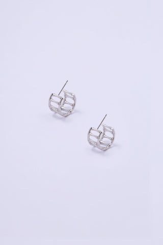 Small bamboo shaped hoop earrings in silver.
